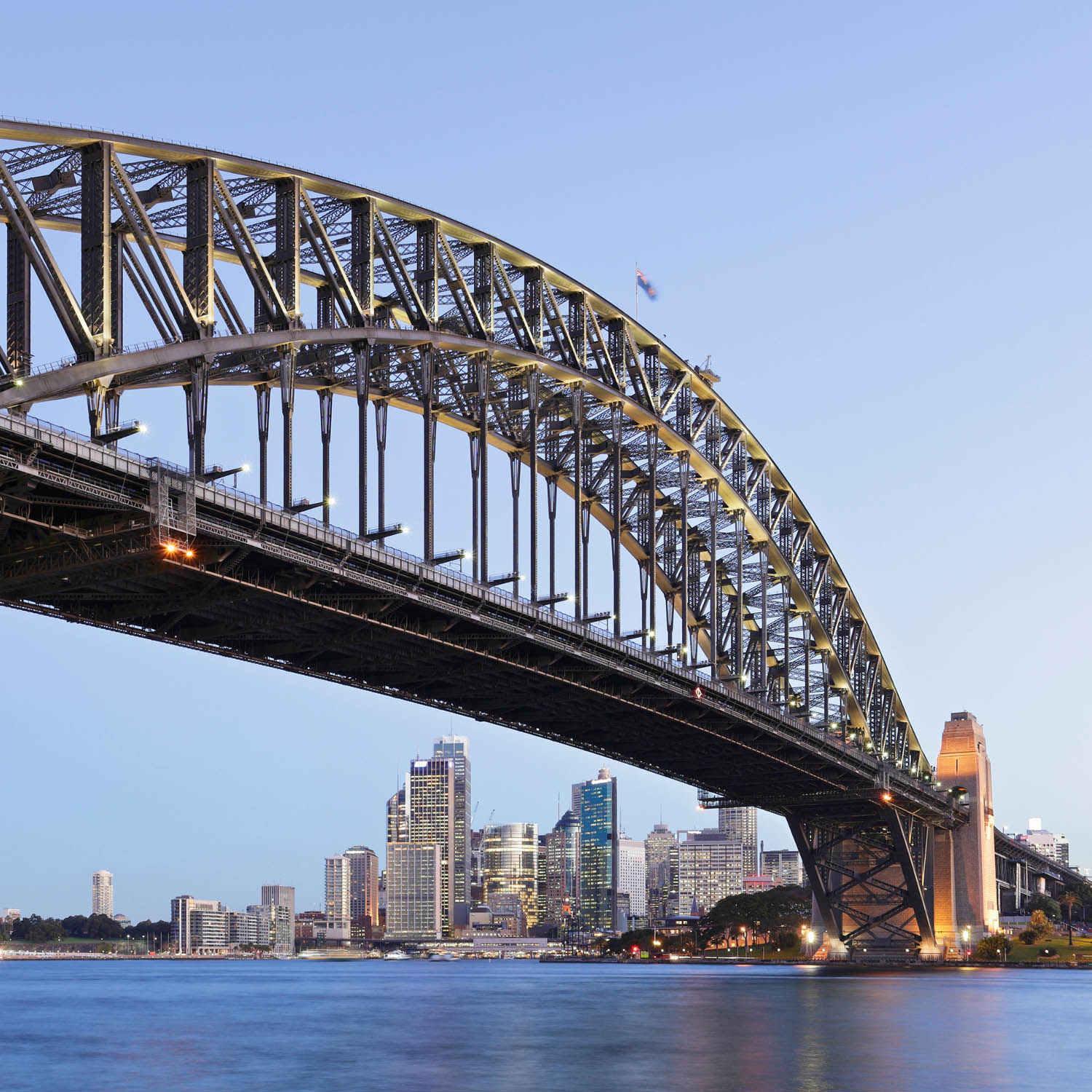 Steel arch bridge over water